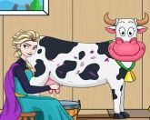 Эльза доит корову